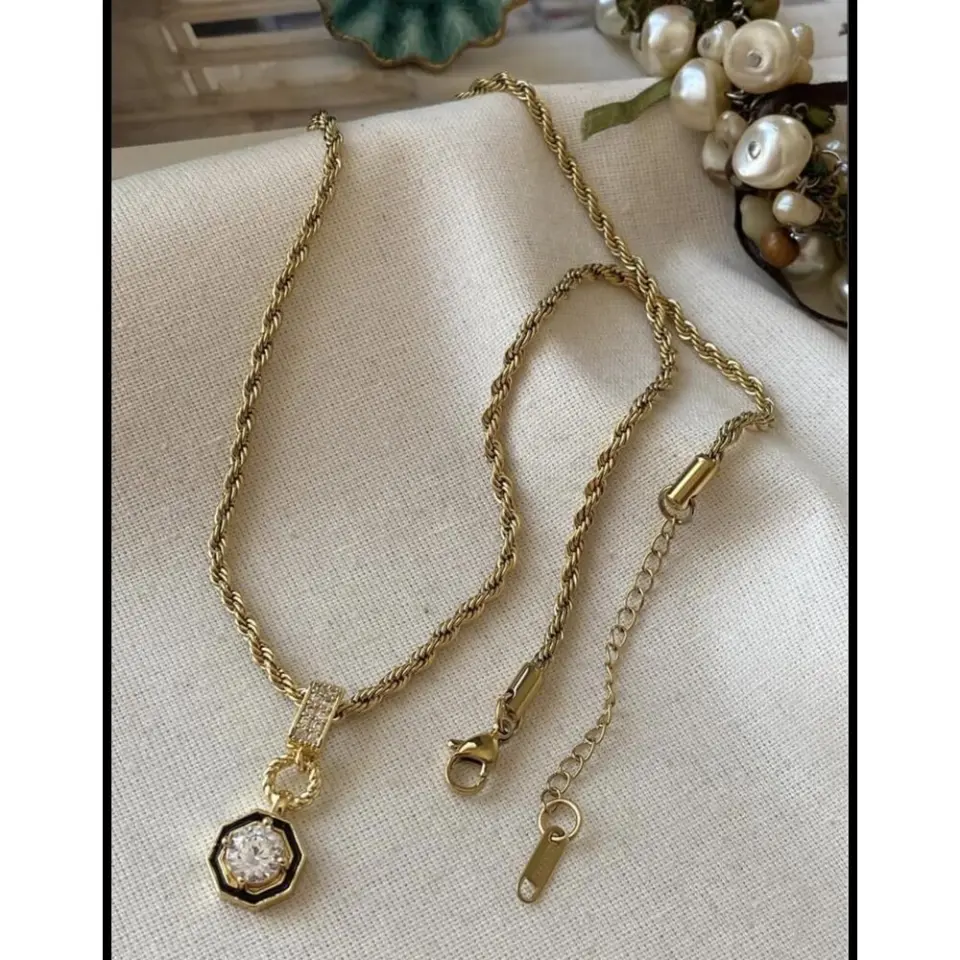 Çelik Burgu Şikel Kolye